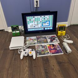 Nintendo Wii Console Bundle with Games and Controller plus TV!!! must take everything