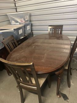 Dark Wood Oval Dining Table with 4 Chairs