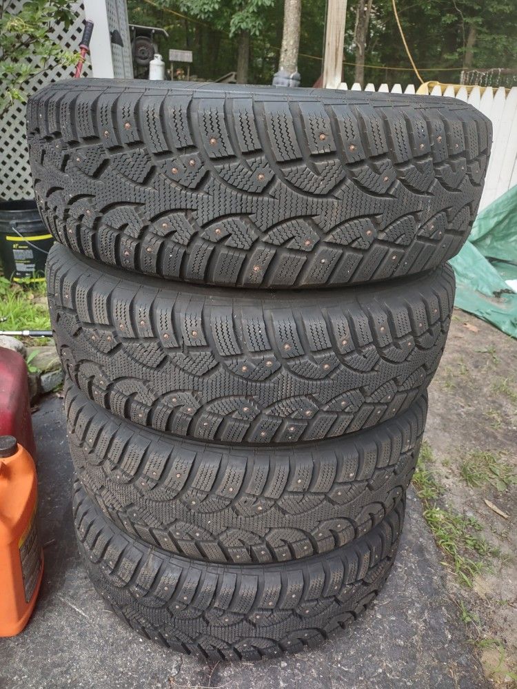 205/70/15 studded snows on 5x114.3 or 5x108 steel wheels.