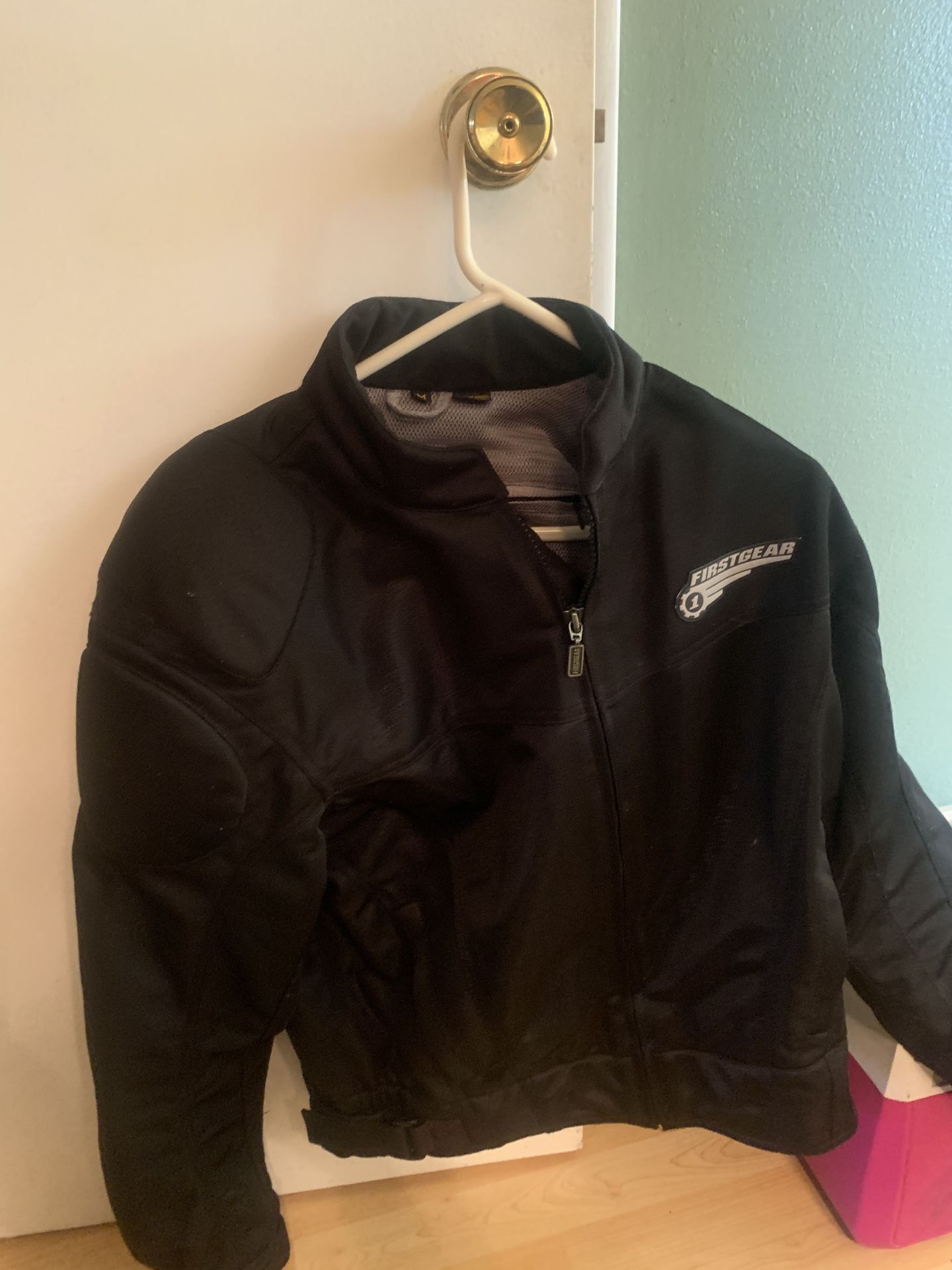 First gear motorcycle jacket with armor