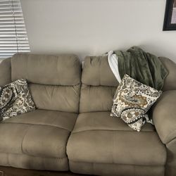 Reclining sofa with massager