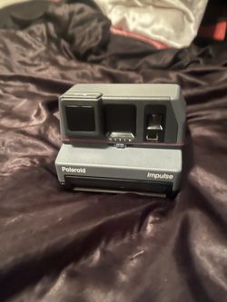 Vintage polaroid impulse camera
