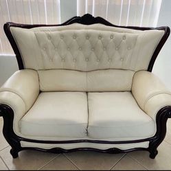 Gorgeous Italian Loveseat with precious Italian leather and solid cherry wood carved finish 