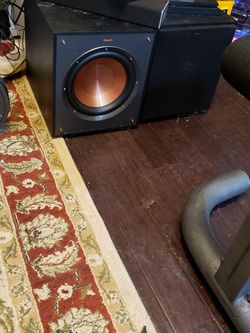 Klipsch subwoofers and 4 tower speakers
