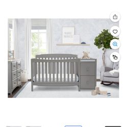 New In box Delta Crib and changing table