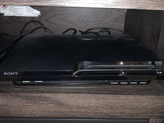 PS3 With 2 Controllers and 16 games