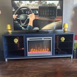 Navy Blue Entertainment Center With Heated Fire Place  
