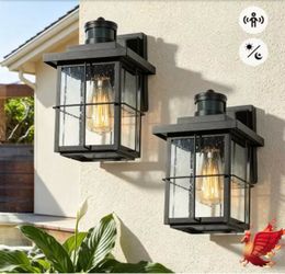 LNC Mill Modern 1-Light Black Motion Sensor Dusk to Dawn Outdoor Wall Lantern Sconce Seeded Glass Exterior Lighting (2-Pack)