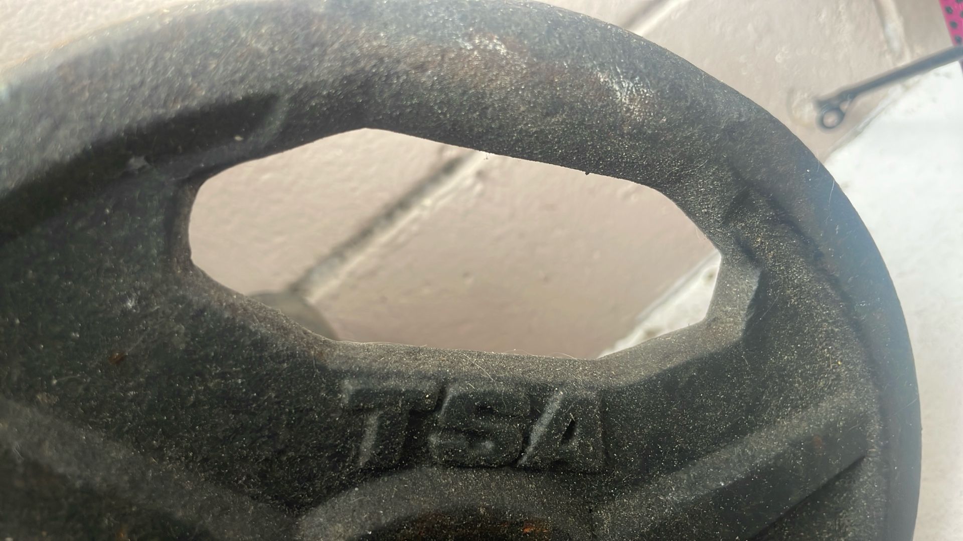 TSA Olympic Grip Weight Disk With 2 In Center