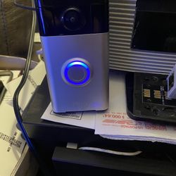 Ring Door bell used comes with charging cord and wall plate 35 ready to set up