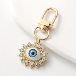Brand New Unisex Gold Toned Rhinestone Blue Evil Eye Keychain & Bag’ Charm
