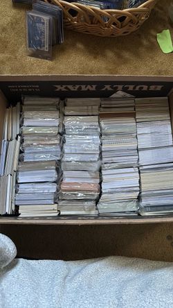 Over 3000 sports Cards all different era’s mostly football baseball and basketball