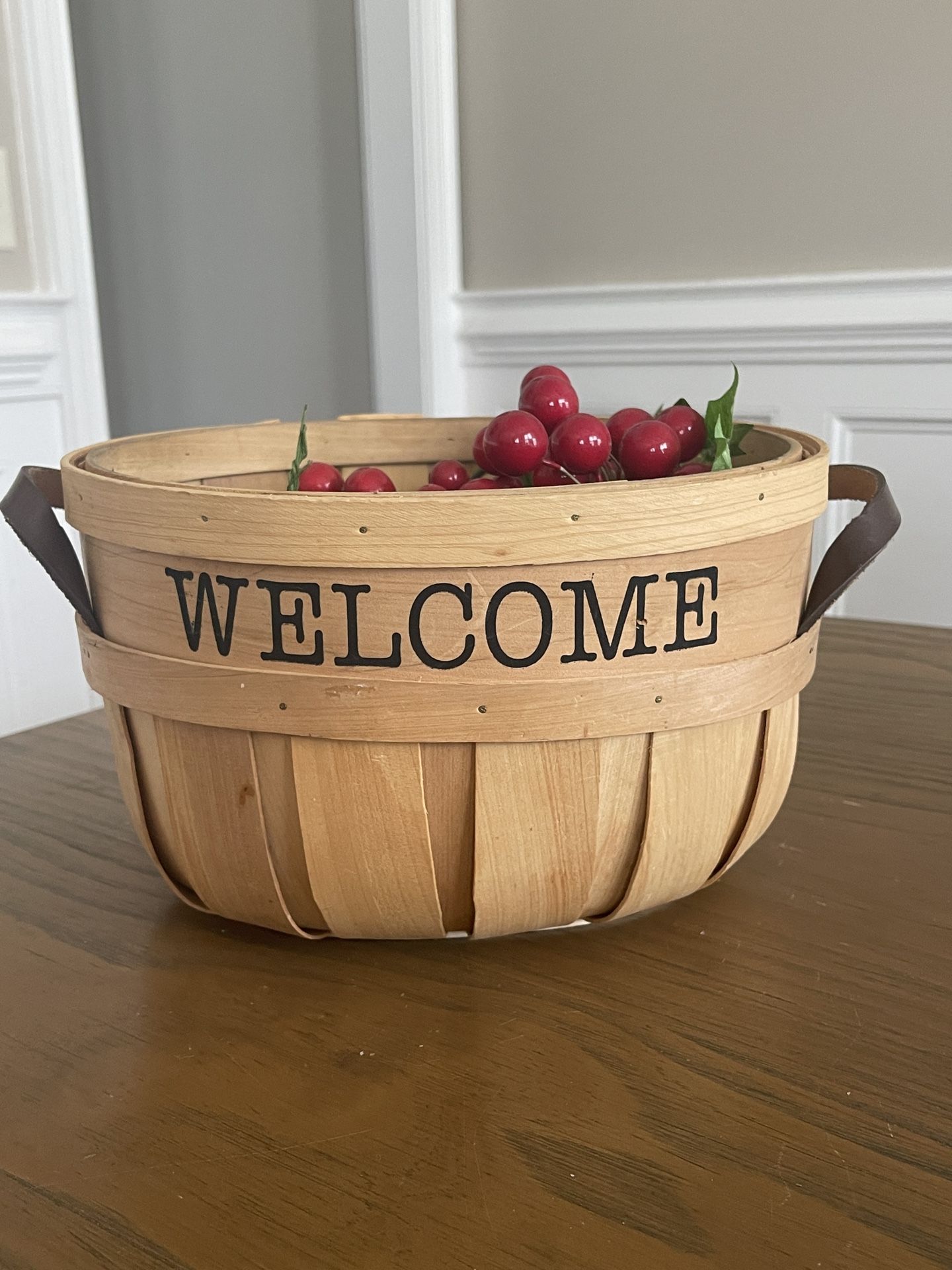 Wooden Basket With Leather Handles And Welcome Printed On The Front 6in T &8in W
