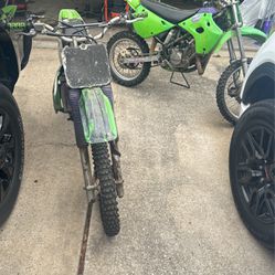 2 Kawasaki Dirt Bikes, Kx 100 And Kx 80 Both Garage Kept
