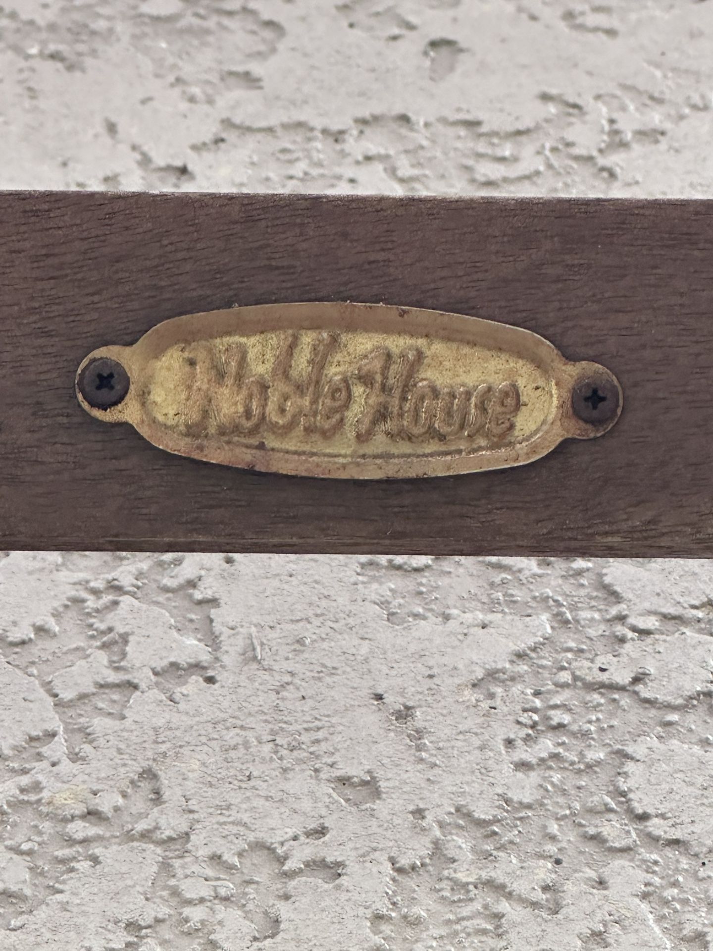 2—Foldable teak wood lounge chairs.