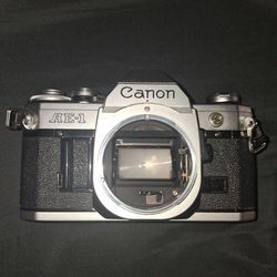 CANON AE-1 FOR PARTS. ADVANCE LEVER IS STUCK.  ASKING $60 OR BEST OFFER