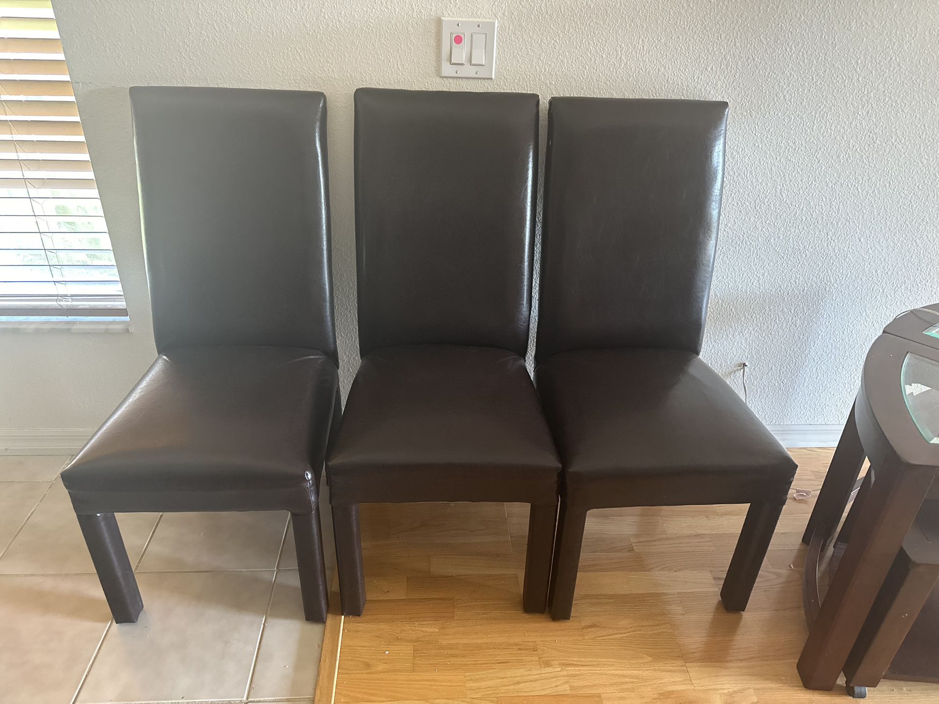 3 Brown Leather Chairs 