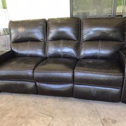 3 Seat Couch With Two Of The Seats Being Recliners