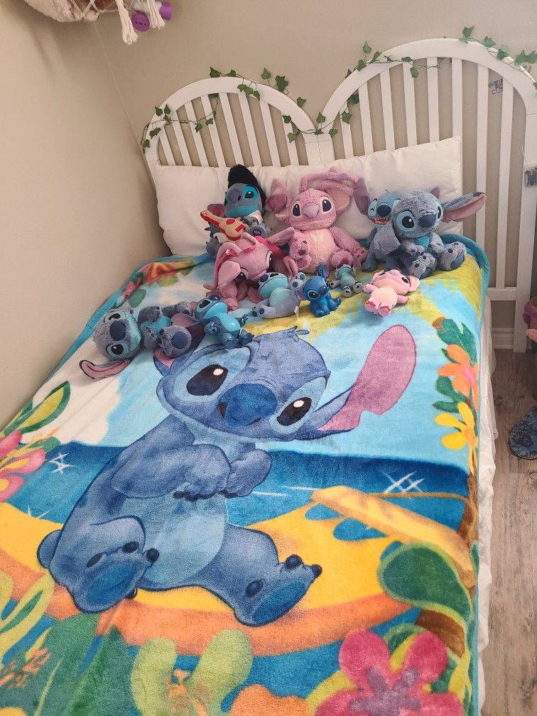 Stitch blanket and stuffed animals