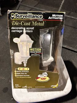 Surveillance by Regent Motion Activated Carriage Lantern