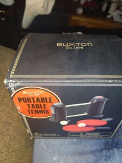 This is a Buxton Portable Table Tennis game set