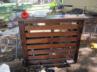 The selected item appears to be a rustic, DIY outdoor bar constructed from upcycled wooden shipping pallets with a stained wood finish