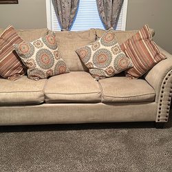 Beige Couch With Pillows