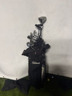 Titleist Golf Bag with Full Club Set Taylormade M2 irons 5-pw aw and sw, nike putter, Taylormade superfast burner driver, rbz 3 wood, callaway x 5 woo