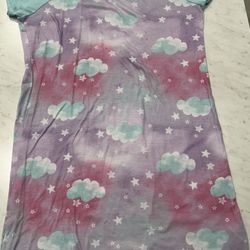 Purple nightgown with cloud and star pattern, short sleeves.