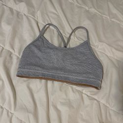Lululemon Gray and white striped sports bra. Measures 13” across but no size tag (fits XS/Sm).