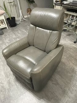 Nice gray leather recliner.