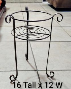 Bronze powder-coated finish. Wrought Iron Scroll Plant Stand
