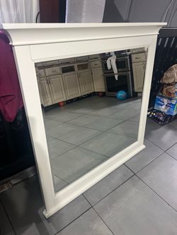 Mirror with frame