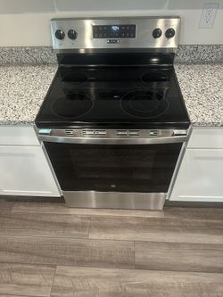 Brand New Microwave And Oven Under Warranty