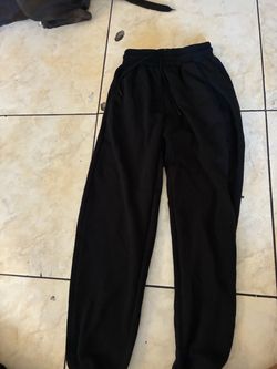 Black sweats , size M