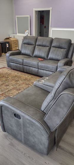 New recliner sofa and loveseat both