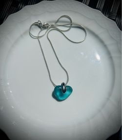 Heart-shaped deep turquoise sea glass on 925 Sterling silver necklace