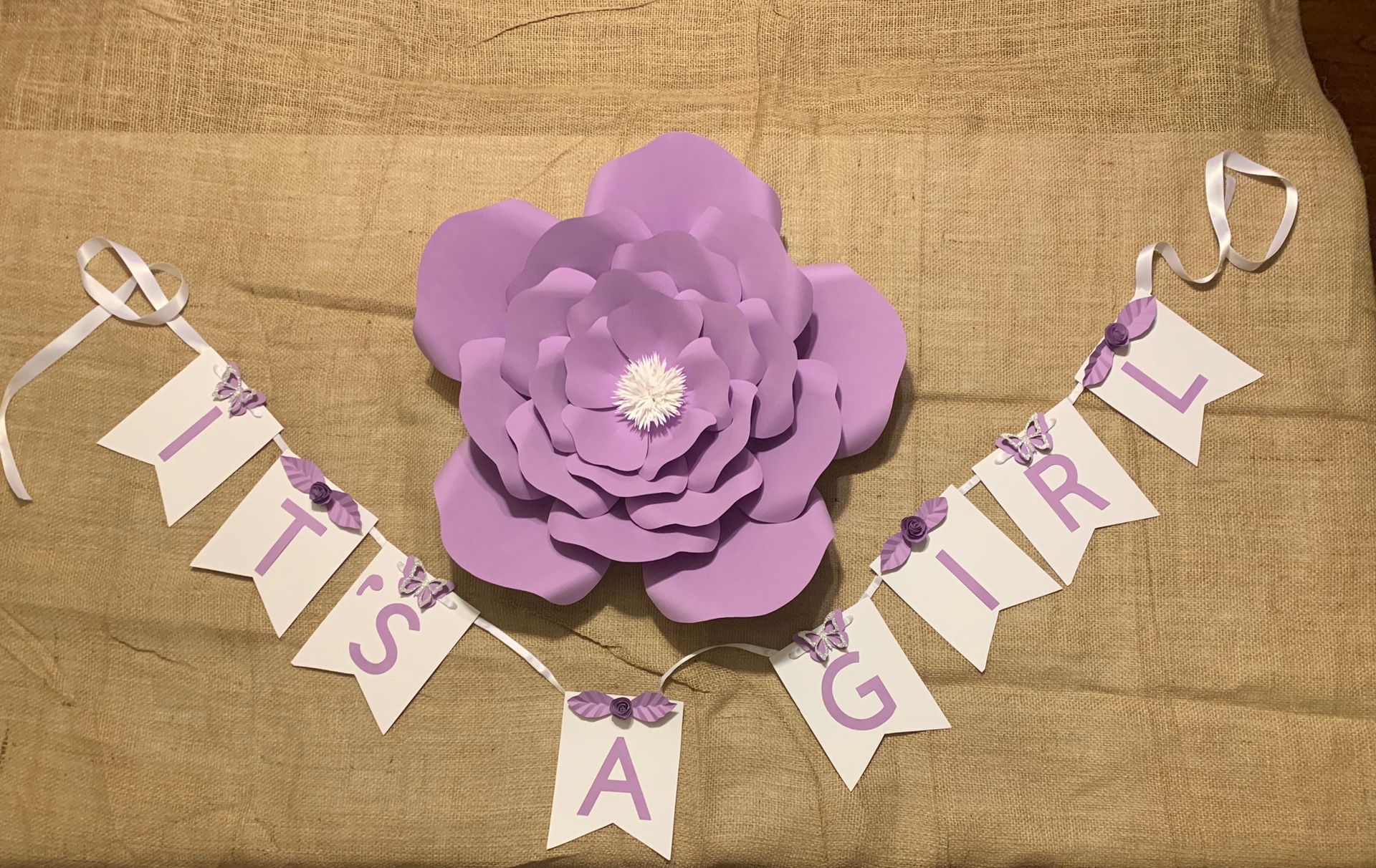 It’s a girl boy party banner for baby gender reveal baby shower decoration lavender purple and white butterflies handmade paper flower