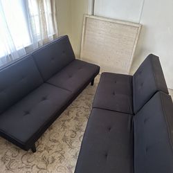  2 Black Reclining Sofas