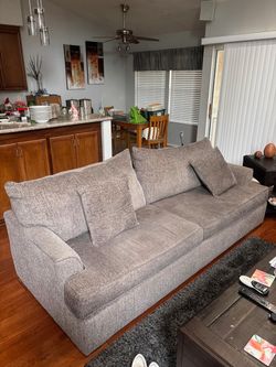 Grey couch, love seat and big chair