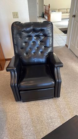 Black recliner armchair