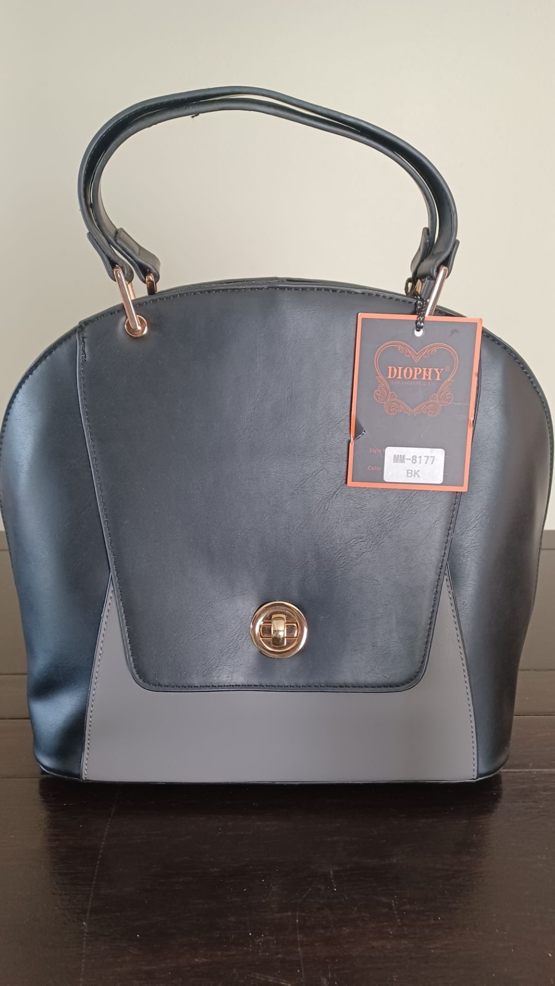New With Tags Black with grey vegan handbag.