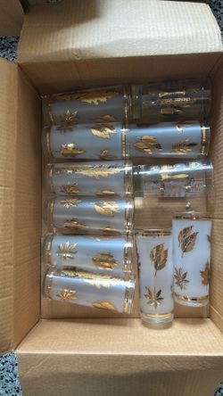 These are vintage Libbey "Golden Foliage" glasses featuring frosted glass and a 22K gold leaf pattern