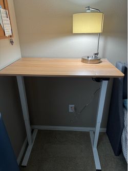 Standing desk, height adjustable
