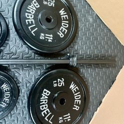 5 ft Standard Barbell with pairs of 25s, 10s and 5 pounders [ All Vintage and reconditioned equipment). Brute Weight= 95#