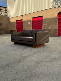 MCM faux leather sofa- delivery available