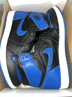 Classic Nike Air Jordan 1 Retro high-top sneakers in black and royal blue. Size USA 11. Has original box too. Sneaker on legit tag