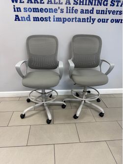 Two high office chairs