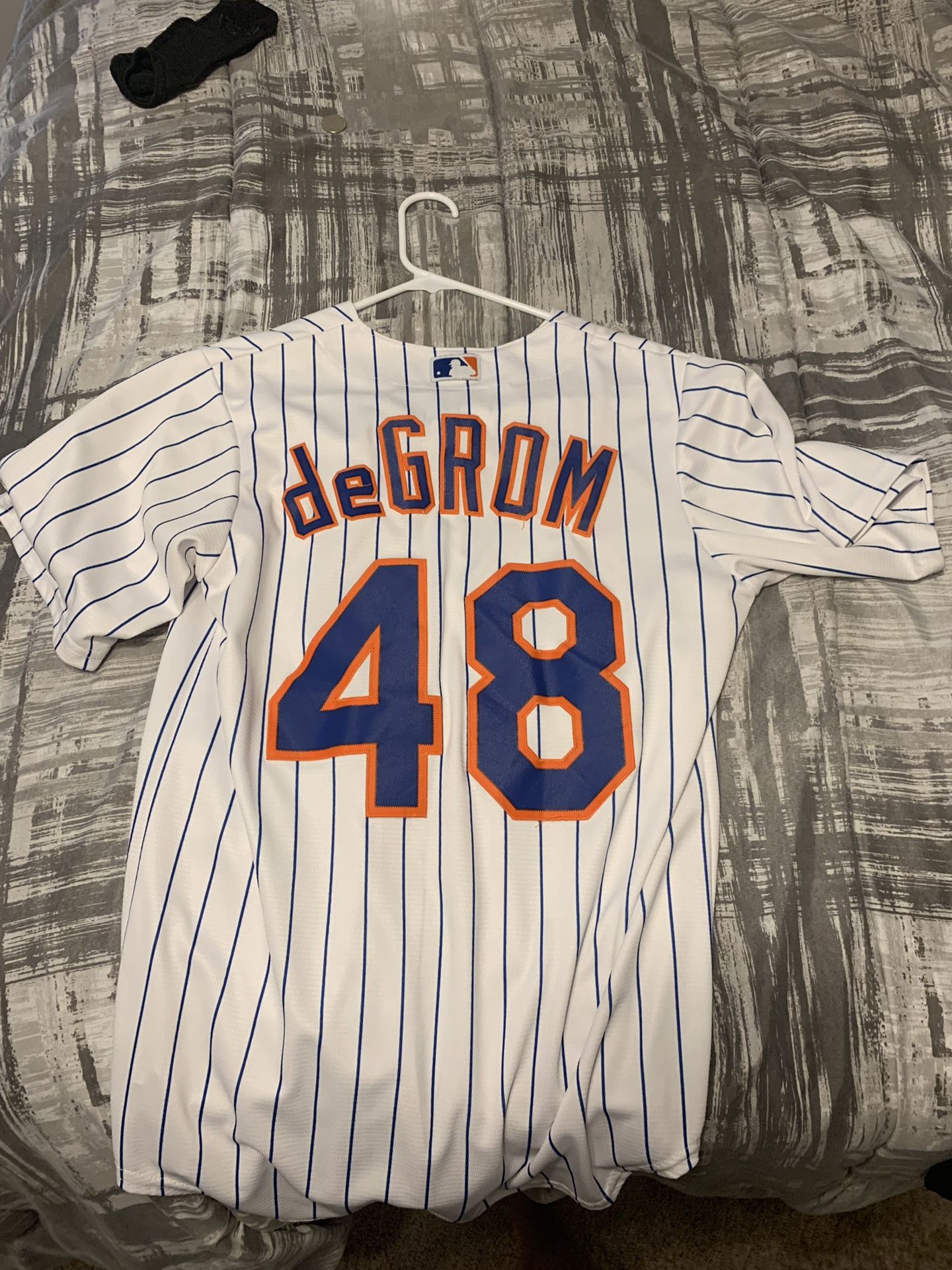 Mets pinstripe jersey. Adult small
