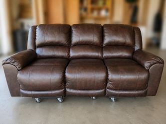 2 piece Ashley’s Furniture Leather Recliner Couches